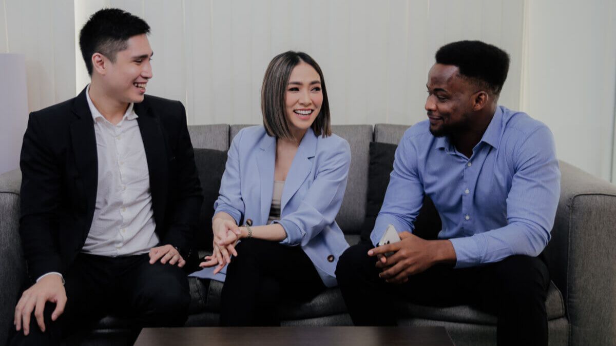 Financial-Service-Outsourcing-1200×675 Three accounting executives are discussing financial services outsourcing.