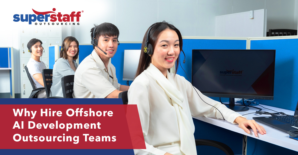 Four of SuperStaff's AI development outsourcing team are busy working with their computers.