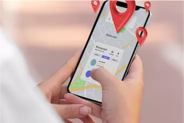 Person Using Maps on Cellphone