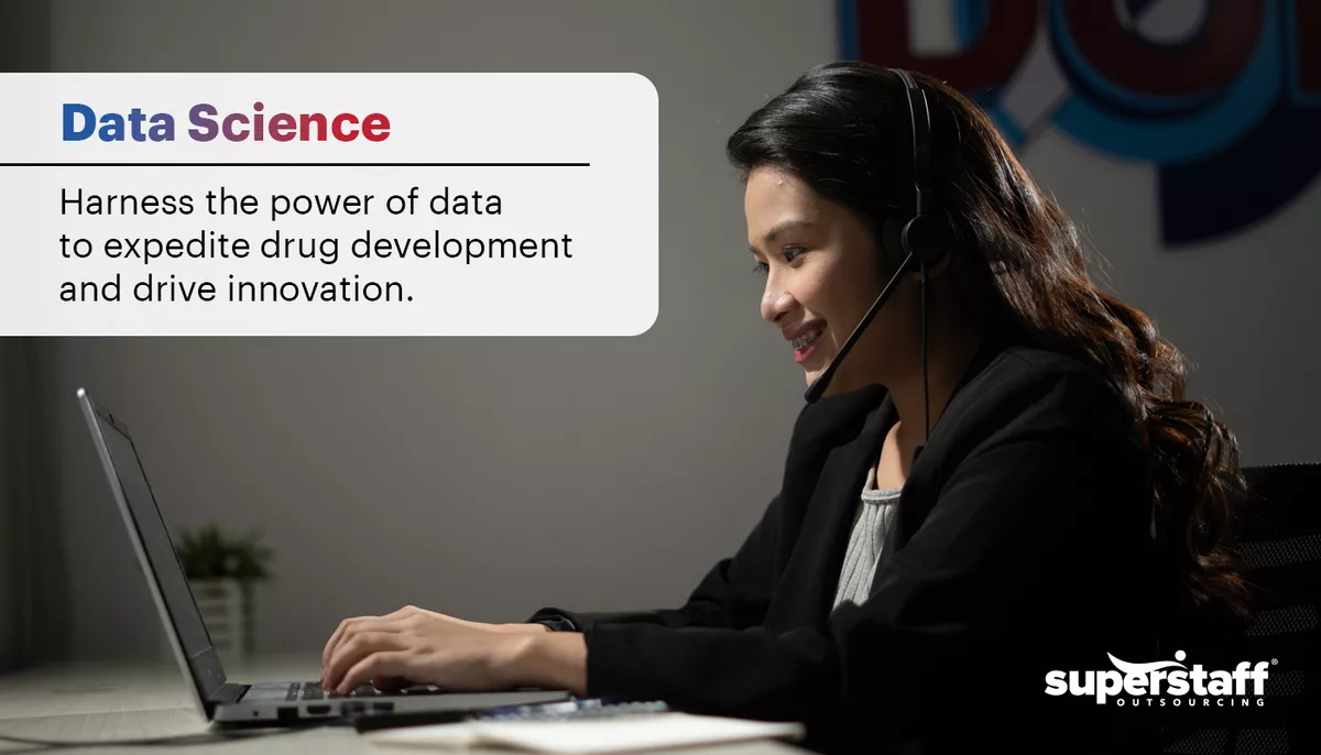 Data-Science Outsourcing pharma non clinical tasks: A data scientist works on her laptop.