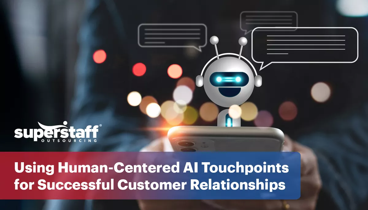 Featured-Image An image shows a chatbot popping out of a mobile phone, representing the power of human-centered AI.