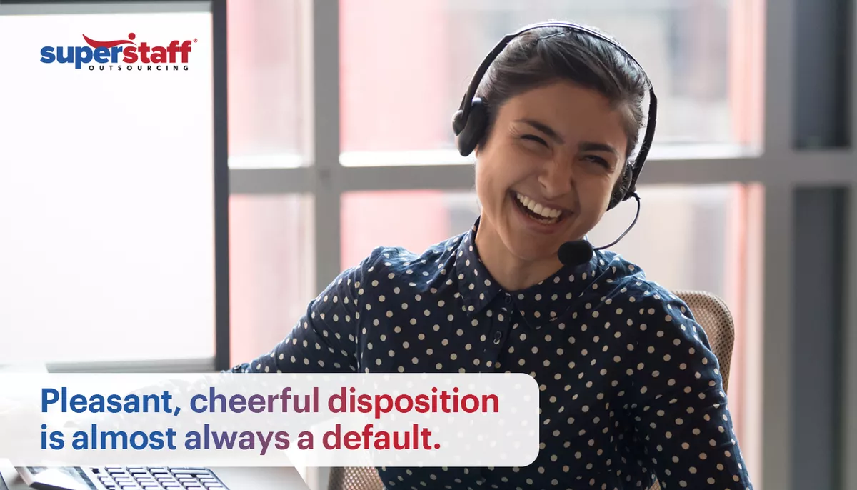 Pleasant,-cheerful-disposition-is-almost-always-a-default A representative smiles cheerily, proving the power of human customer service.