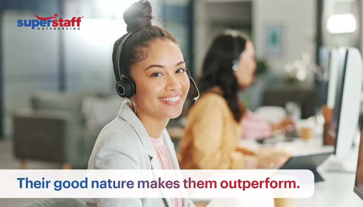 Their-good-nature-makes-them-outperform Girl smiling while working