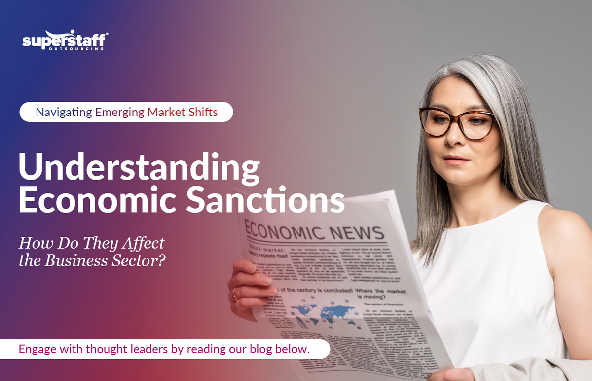 Understanding-Economic-Sanctions_Featured_V1 An executive is reading a newspaper. Image caption reads: Understanding Economic Sanctions: How Do They Affect the Business Sector?