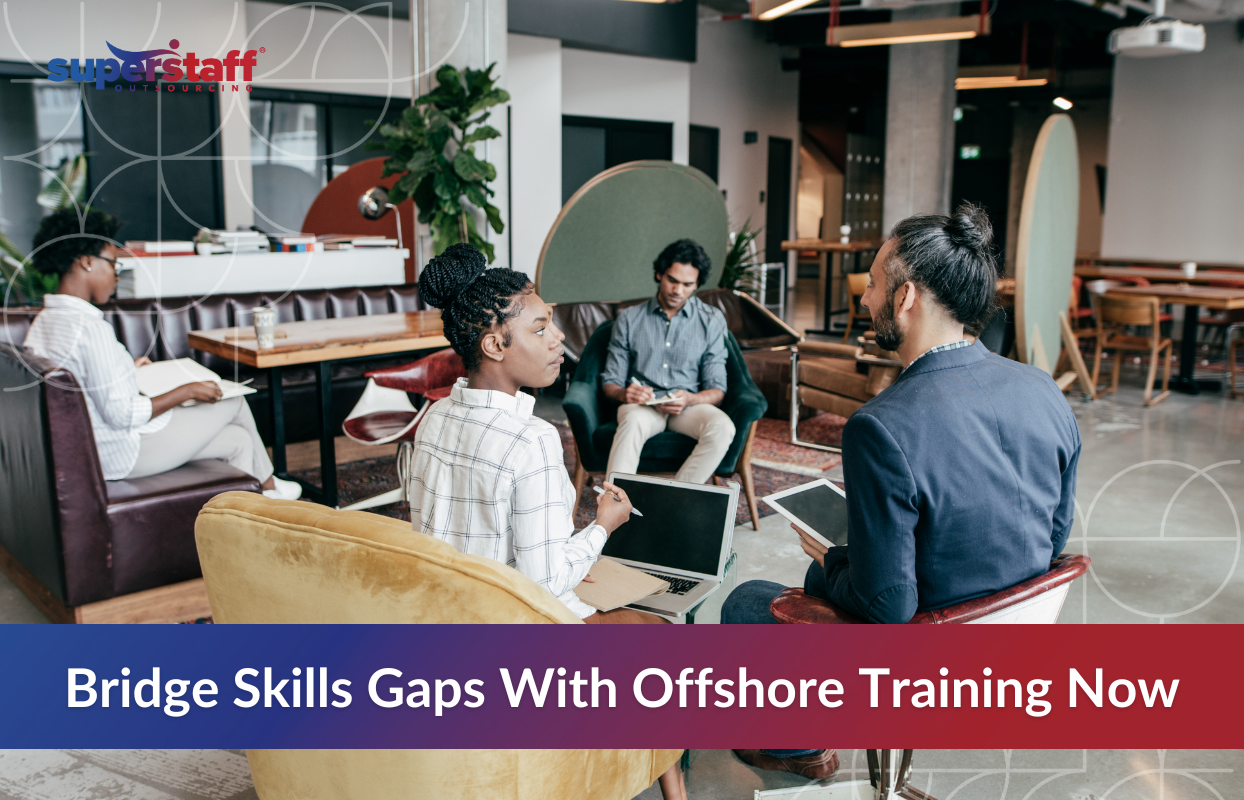Team in a modern office setting engaged in collaborative learning session, representing how companies use offshore training classes to bridge skills gaps and enhance workforce capabilities.
