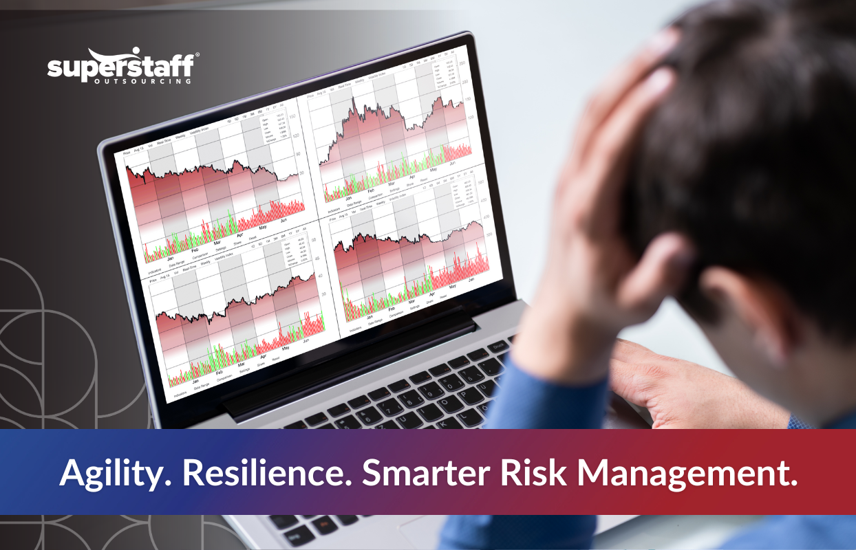 Person reviewing volatile stock market data on a laptop screen, representing financial risk management challenges in 2025.