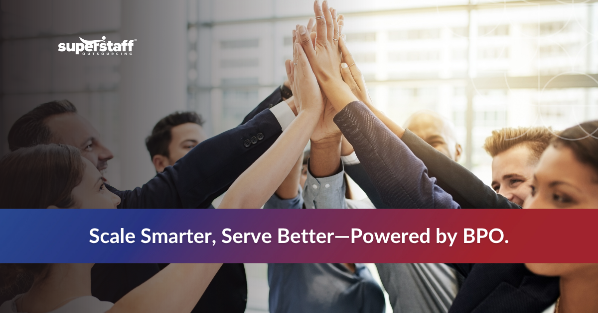 BPO Industry Trends_Featured Group of diverse professionals celebrating teamwork with hands joined, emphasizing BPO advantages for business growth