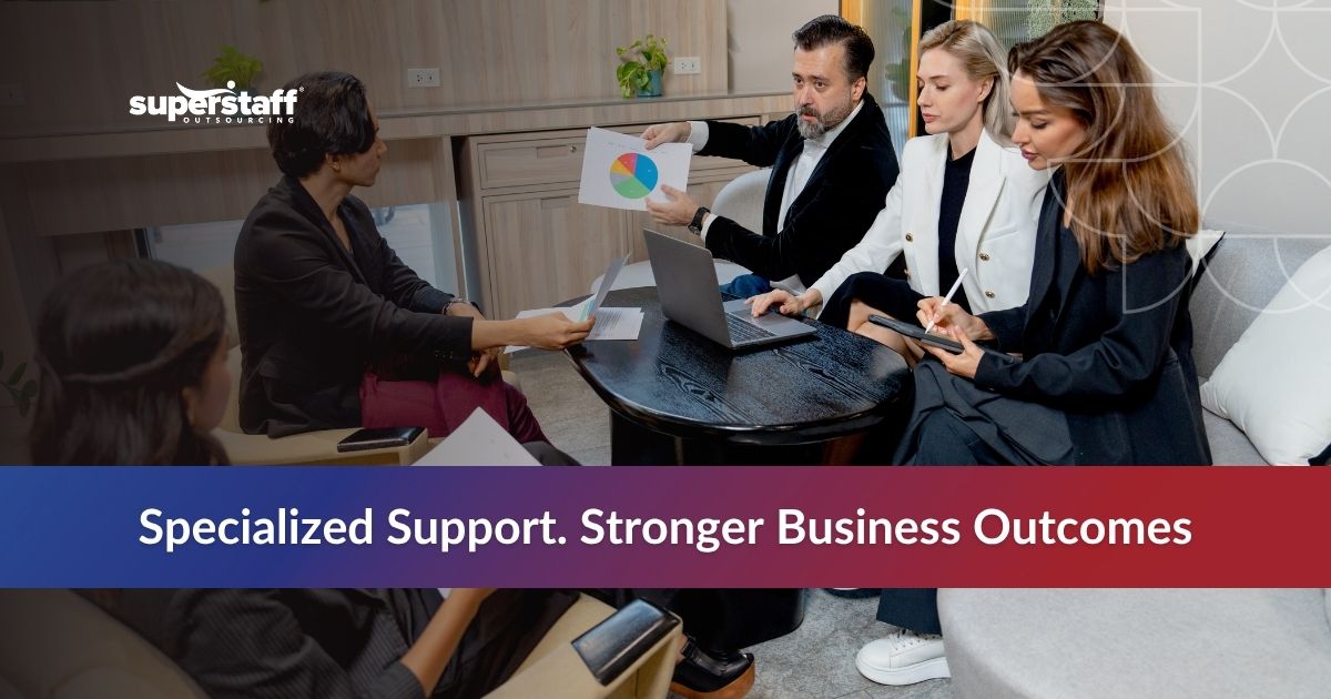 Verticalized BPOs_Featured Business team collaborating on industry-specific solutions during a meeting in a modern office space.