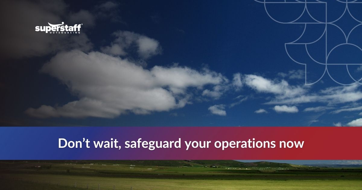 Windows 10 End-of-Life_Featured Scenic view of clouds over a green landscape with text urging businesses to safeguard their operations.