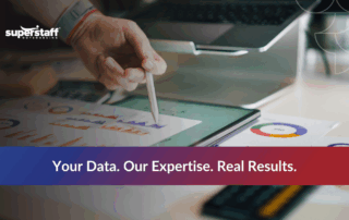 Team analyzing data through business intelligence outsourcing