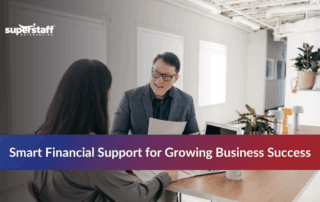 Two finance workers providing outsourced accounting services in office setting