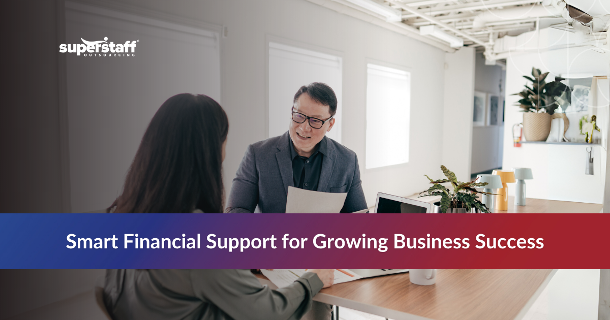 Two finance workers providing outsourced accounting services in office setting